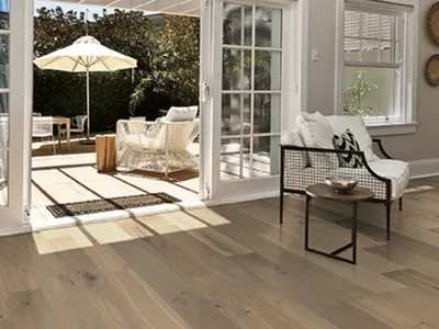 Premium engineered hardwood flooring sample showing rich wood grain and texture