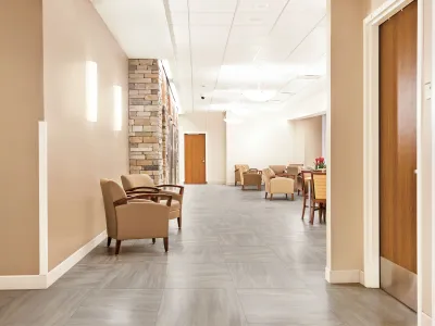 Luxury vinyl tile flooring displaying modern wood-look pattern with waterproof features